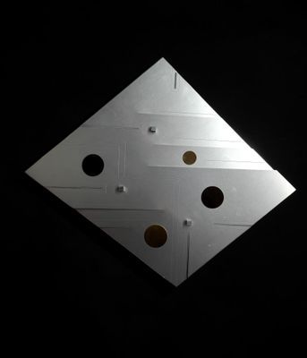 a picture of a piece of metal with holes in it