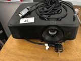 an image of a projector sitting on top of a wooden table