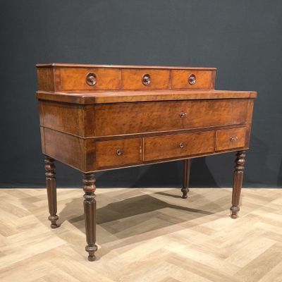 an old wooden dresser with two drawers on top of it