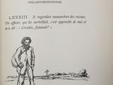 an old book with a drawing of a man standing on a beach