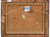 an old picture frame with a piece of paper taped to it