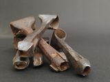 several pieces of metal that are sitting on top of a table