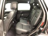 the interior of a car with the front seats folded down