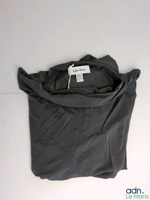 an image of a black shirt with a tag on it
