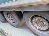 a truck that is parked on the side of the road