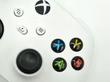 a close up of a video game controller on a table