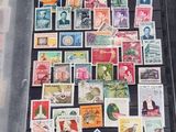 a lot of stamps that are on the table