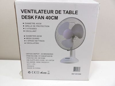 an image of a box of a desk fan on a table
