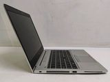 a laptop computer that is sitting on a table