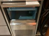 an image of a microwave built into a kitchen counter