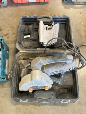 a box of tools that are sitting on the floor