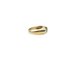 an image of a gold ring with a green stone in the middle