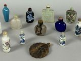 many different types of vases and bottles on the table