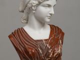 marble bust of a woman with a turban on her head
