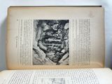 an open book with a picture of a man on it