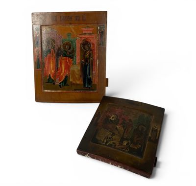 un vieux cadre en bois contenant un tableau représentant un homme et une femme