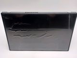 the back of a black laptop computer sitting on top of a white surface