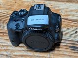 a camera that is sitting on a wooden table