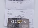 a picture of a card with a gold ring on it