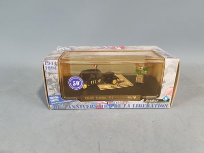 a box with a toy car in it on a table