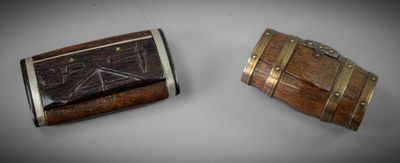 two pieces of wood that are sitting on a table