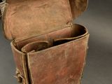 an old suitcase that is sitting on a table