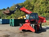 a red crane that is sitting on top of a truck