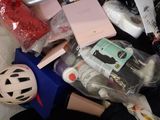 a pile of items that are sitting on a bed