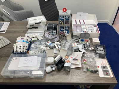 a table with a lot of electronics on it