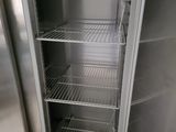 an open refrigerator that is sitting in a kitchen