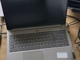 two laptops that are sitting on a table