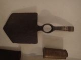 a small piece of metal that is laying on a table