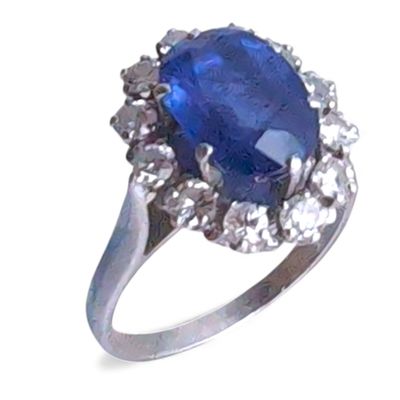 BAGUE en platine sertie d'un saphir entouré de diamants Poid… - Photo 1