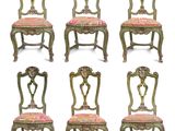 set of six antique chairs with pink upholstered cushions