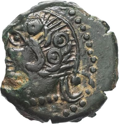 une pièce de monnaie ancienne sur laquelle figure l'image d'un oiseau