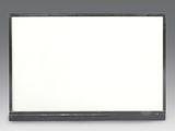 a close up of a white board on a table with a gray background