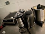 a lot of appliances that are sitting on the counter