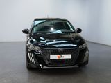 a picture of a black car in a showroom