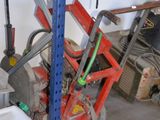 an image of a garage with a lot of tools on the shelves