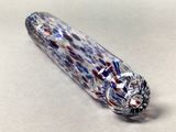 a close up of a glass object on a table