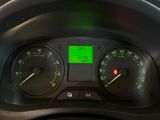 a close up of the dashboard of a car with a green screen