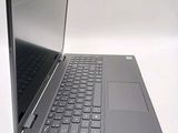 a laptop that is open and sitting on a table