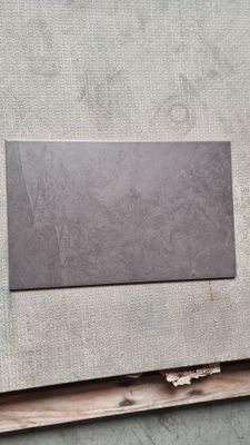 an image of a picture of a piece of metal on a piece of wood