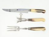 three different types of knives on a white surface