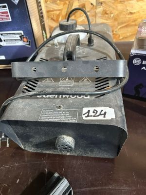 an image of a machine sitting on top of a table next to a box