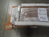a toilet that is wrapped in plastic and sitting on top of a box