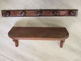 a wooden shelf with a shelf on it and a shelf on the floor
