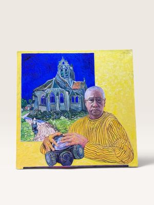 tableau représentant un homme tenant un appareil photo devant une église