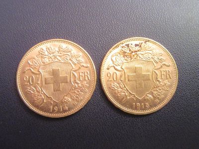 deux pièces d'or sur lesquelles figure un blason