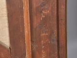 an old wooden door with a wooden handle and a wooden frame